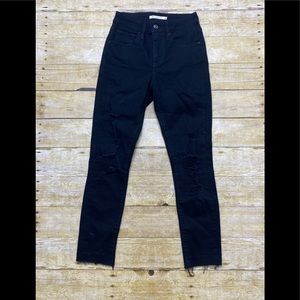 Levi’s 721 high rise skinny distressed raw hem